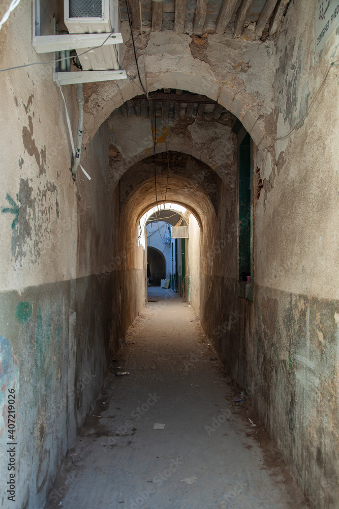 An alleyway under arches in Tripoli, Libya, in Ghadema, or the medina, or old city.