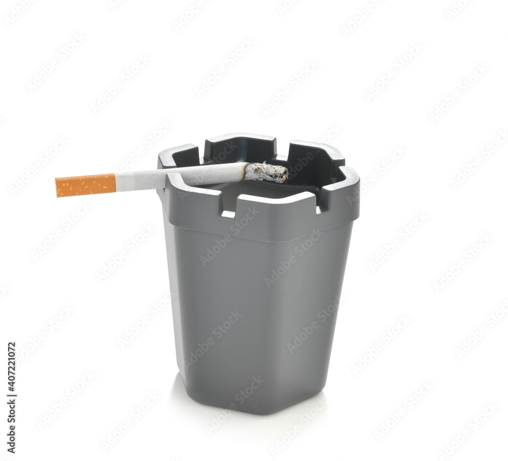 Smoked cigarette butt on ashtray isolated on white background
Smoked cigarette butt on ashtray isolated on white background
