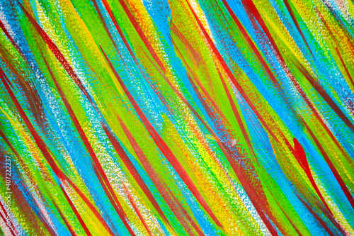 Many different multi-colored lines are chaotically drawn with brush