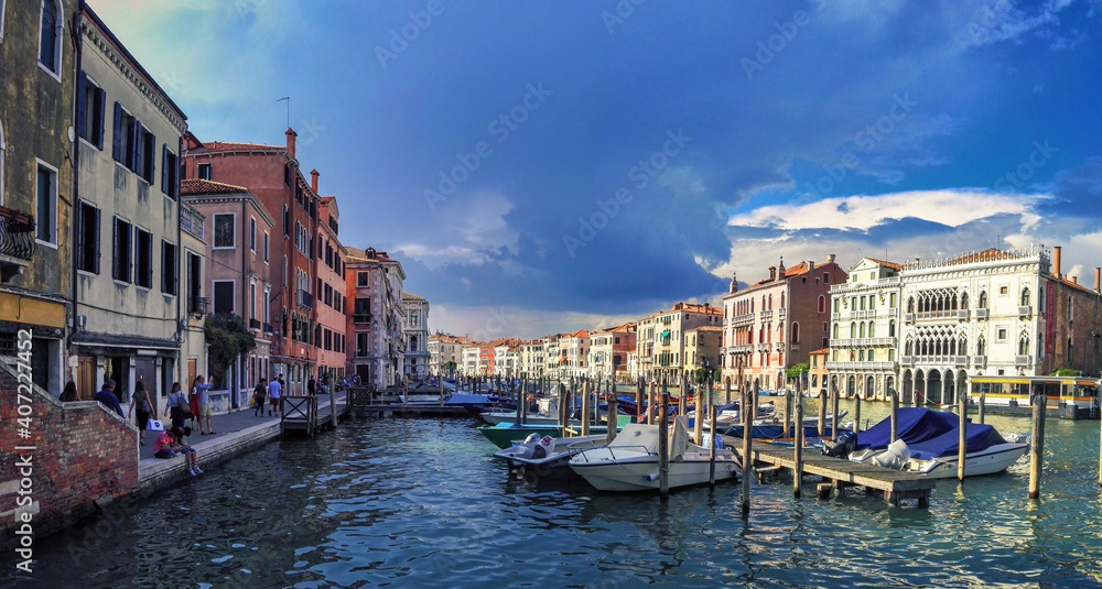 Venice, Italy - September 03, 2018: Wide angle panorama shot of canal view from Rialto bridge