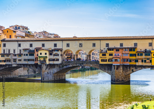 View of medieval stone bridge Ponte Vecchio and the Arno River in Florence, Italy