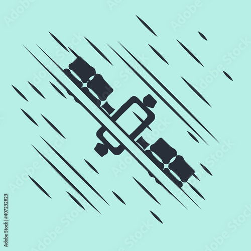 Black Satellite icon isolated on green background. Glitch style. Vector.