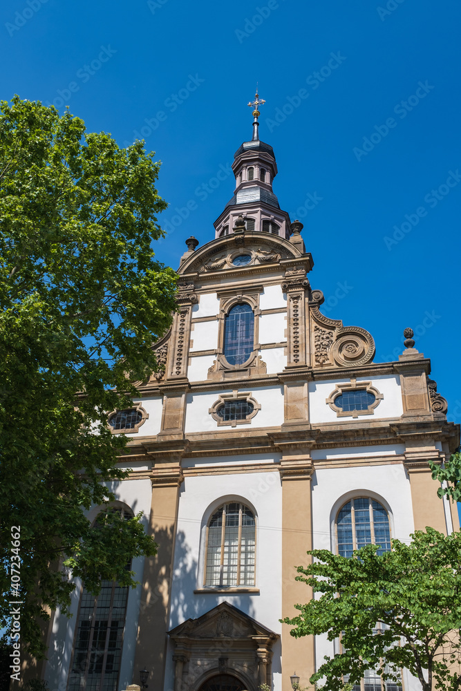 View of the Dreifaltikkeitskirche in Speyer / Germany against a blue sky View of the Dreifaltikkeitskirche in Speyer / Germany against a blue sky
