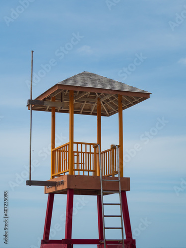 Beach guard tower installed on the sandy beach for the safety of tourists. © VICHAILAO