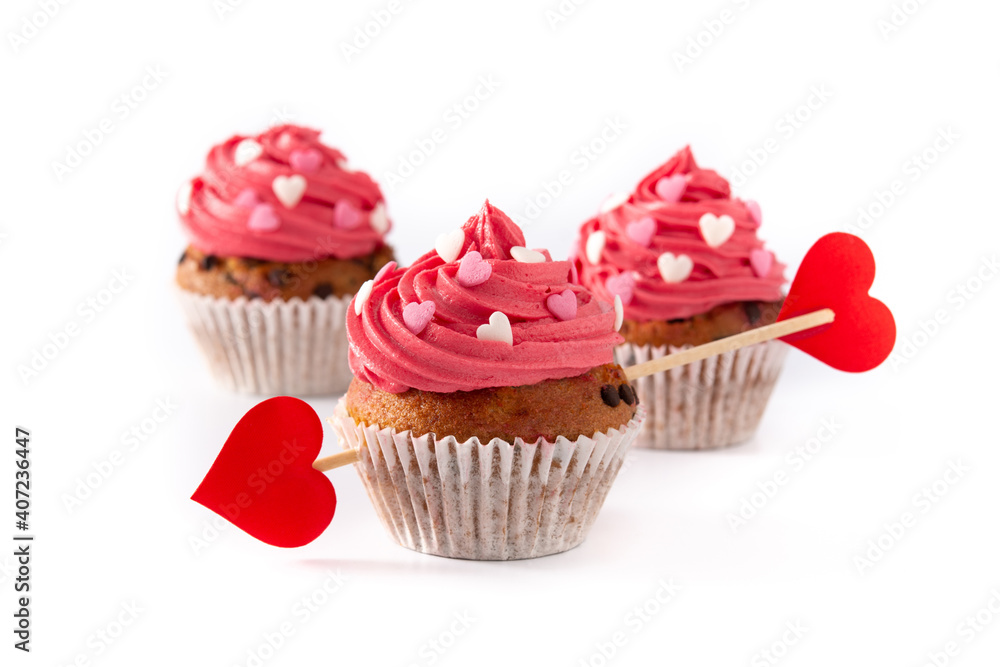 Cupcake decorated with sugar hearts and a cupid arrow for Valentine's Day