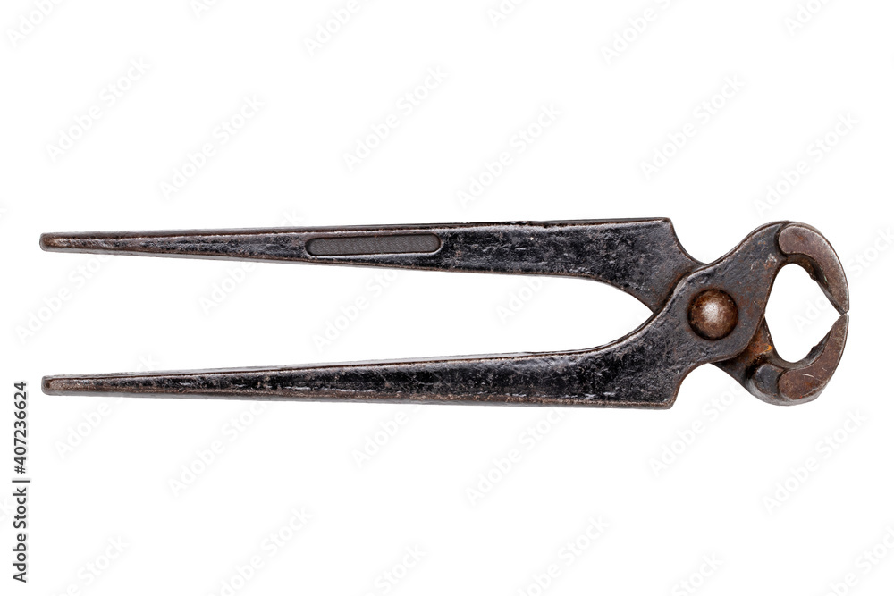 Craftsman tools isolated. Old open rusty pinching pliers to used for removing nails from wood. Macro of vintage tools. Craftsman tools isolated. Old open rusty pinching pliers to used for removing nails from wood. Macro of vintage tools.