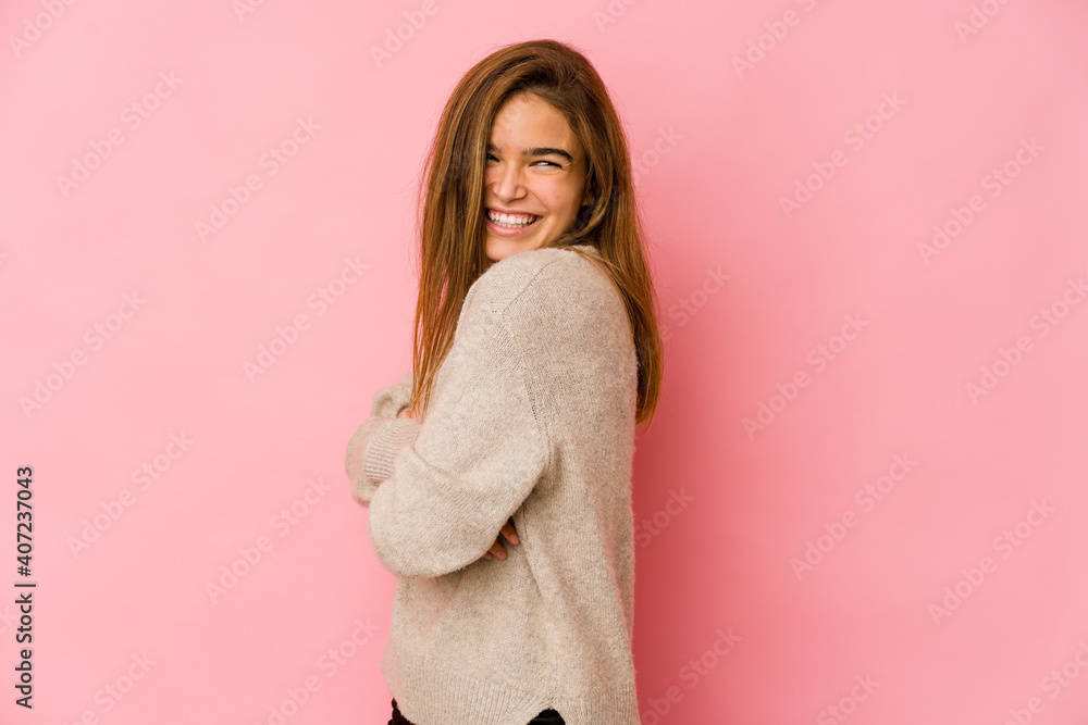 Young skinny caucasian teenager girl laughing and having fun. Young skinny caucasian teenager girl laughing and having fun.