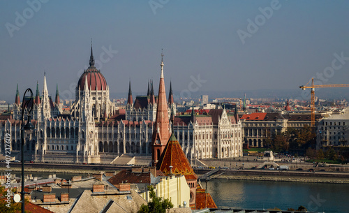 View of the tower Hungarian parliament on the river Danube of the historic Old Town of Budapest Hungary from a height.