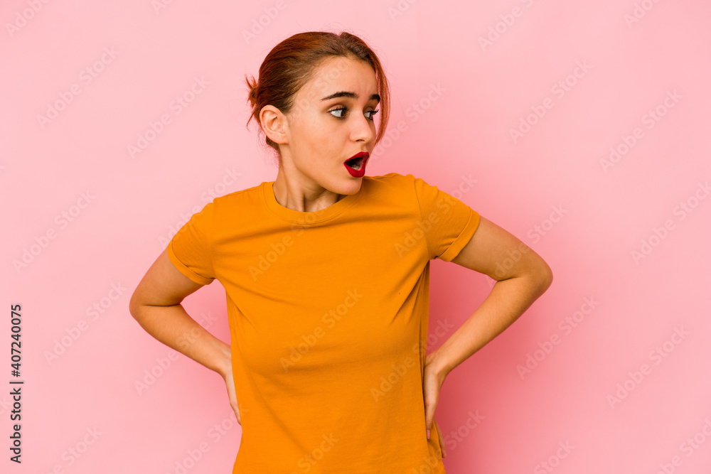 Young arab mixed race woman being shocked because of something she has seen. Young arab mixed race woman being shocked because of something she has seen.