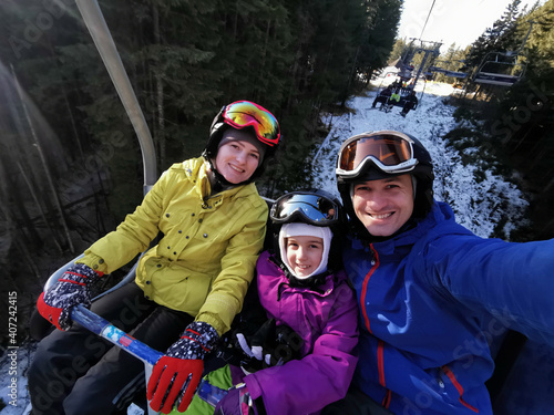 Skiing, ski lift, winter - skiers on ski lift