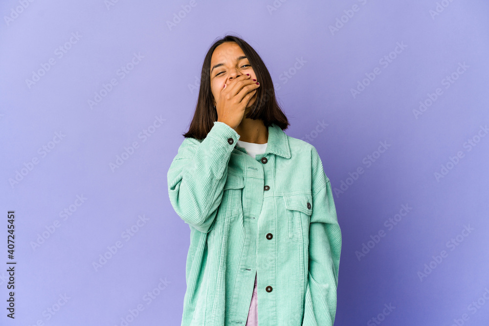 Young mixed race woman laughing happy, carefree, natural emotion. Young mixed race woman laughing happy, carefree, natural emotion.