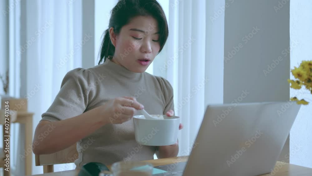 attractive asian female use laptop working online conference meeting social distancing new normal working lifestyle,asian woman working near big glass window morning time attractive asian female use laptop working online conference meeting social distancing new normal working lifestyle,asian woman working near big glass window morning time