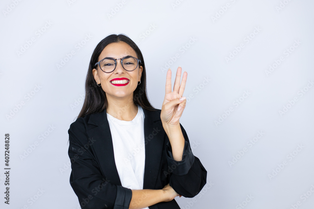 Beautiful business woman showing and pointing up with fingers number three while smiling confident and happy Beautiful business woman showing and pointing up with fingers number three while smiling confident and happy
