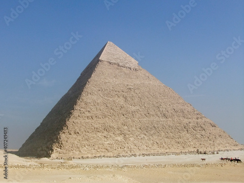 Pyramids of Giza in Cairo with heat haze over the desert. The oldest of the Seven Wonders of the Ancient World.