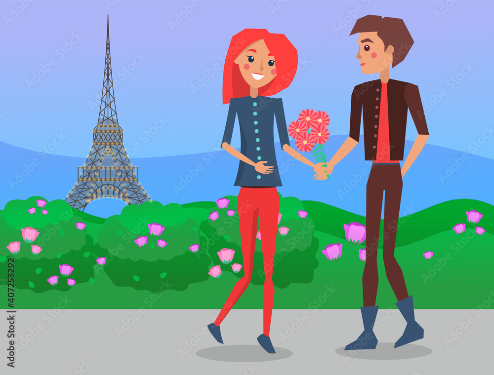Modern guy gives flowers to red-haired girl. Pink bushes in urban park, Eiffel tower on the background. Paris, romance, France. A romantic date in the city of love. Paris symbol. Travel to France Modern guy gives flowers to red-haired girl. Pink bushes in urban park, Eiffel tower on the background. Paris, romance, France. A romantic date in the city of love. Paris symbol. Travel to France