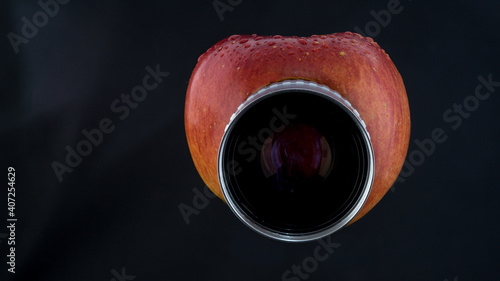 Apple fruit with lens and water drops