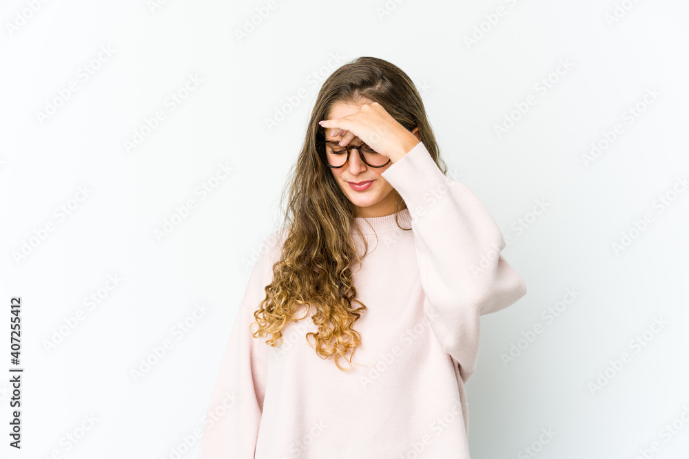 Young caucasian woman having a head ache, touching front of the face. Young caucasian woman having a head ache, touching front of the face.