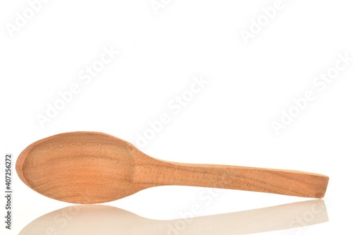 One wooden spatula, for the kitchen, close-up, isolated on white.