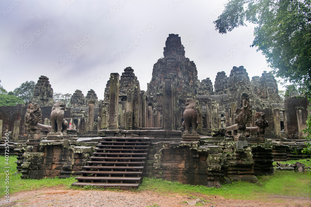 Bayon the central temple of Angkor Thom, late 12th century.It rains in the rainy season. (Cambodia, 04.10. 2019) Bayon the central temple of Angkor Thom, late 12th century.It rains in the rainy season. (Cambodia, 04.10. 2019)