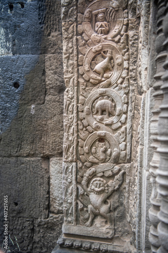 Та Prohm is the temple, it rains in the rainy season.The preserved symbiosis of stone and wood allows us to see Ta Prohm in this form.Bas-relief.(Cambodia, 04.10. 2019).