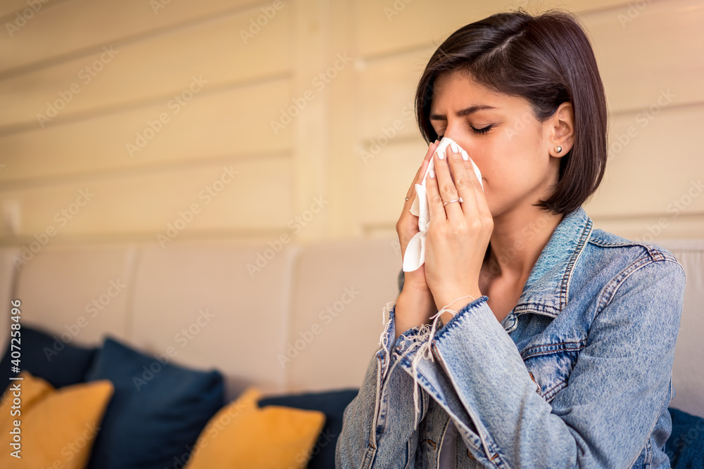 Cold And Flu. Beautiful Woman Caught Cold, Feeling Sick And Sneezing In Paper Wipe. Healthcare Concept. Cold And Flu. Beautiful Woman Caught Cold, Feeling Sick And Sneezing In Paper Wipe. Healthcare Concept.