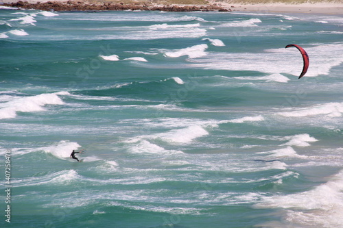 Kite surfing on Witsand beach photo