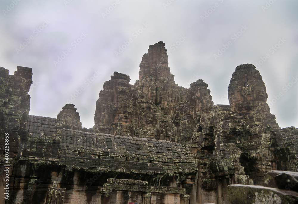 Bayon the central temple of Angkor Thom, late 12th century. It rains in the rainy season. (Cambodia, 04.10. 2019) Bayon the central temple of Angkor Thom, late 12th century. It rains in the rainy season. (Cambodia, 04.10. 2019)