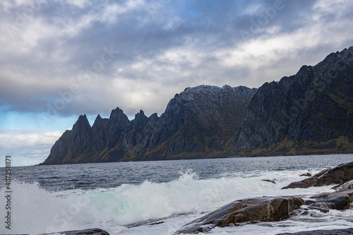 Mountains of Senja surrounded by water in north Norway