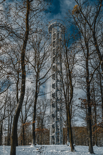 Lookout tower Brno in forest. View from viewpoint Brno Holedna. Jundrov viewpoint. Steel watchtower. photo