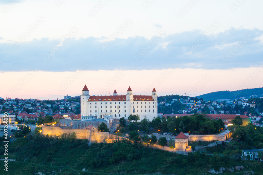 Beautiful view of the Bratislava castle on the banks of the Danube in the old town of Bratislava, Slovakia on a sunny summer day