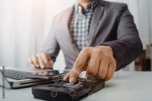 businesswoman hand using smart phone, tablet payments and holding credit card online shopping, omni channel, digital tablet docking keyboard computer at office in sun light
