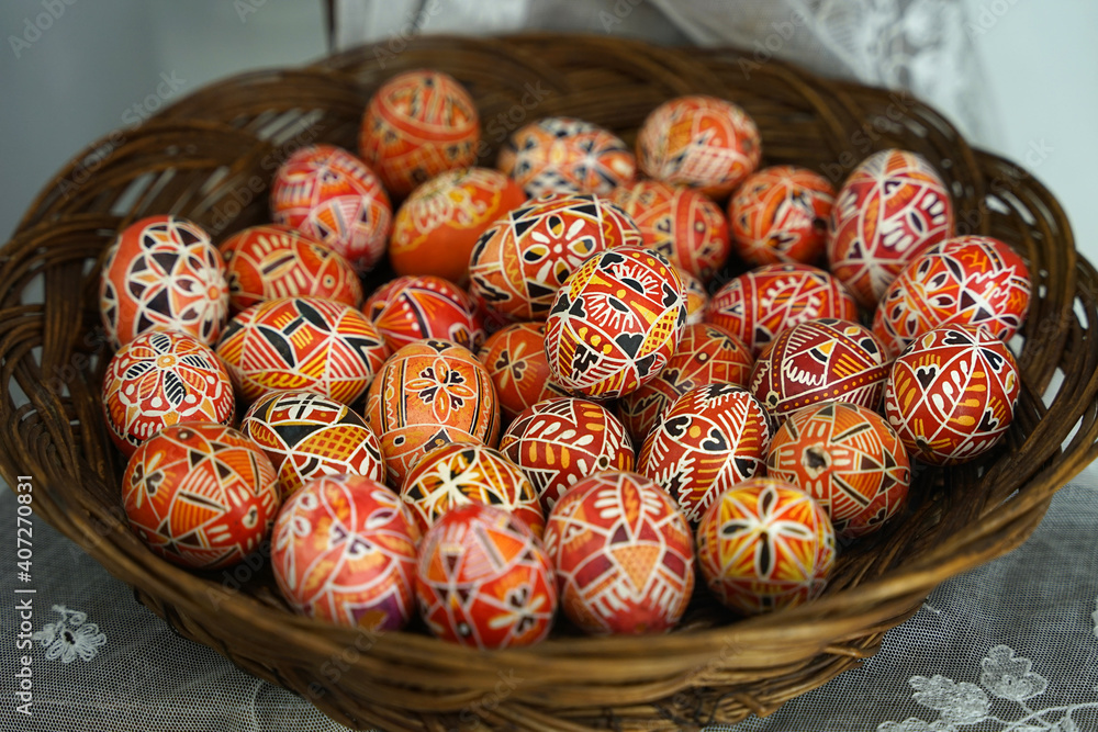 Traditional hand made painted easter eggs in wicker basket, Eastern Europe  Stock Photo | Adobe Stock