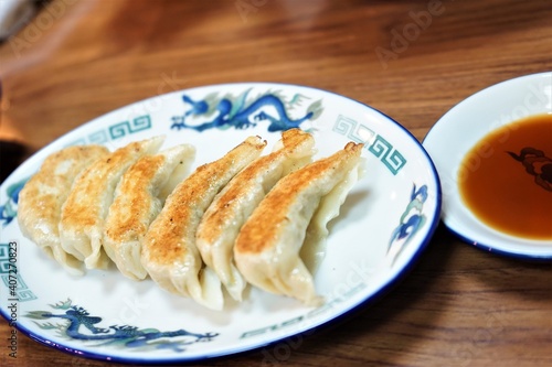 Yaki Gyoza or Grilled Dumplings Snack with soy sauce - 焼き餃子 醤油