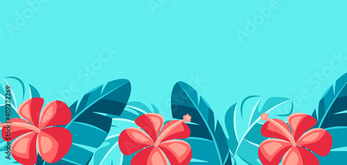 Background with hibiscus flowers and palm leaves.