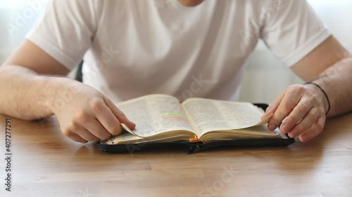 Sunday readings bible, a christian man reading the bible.