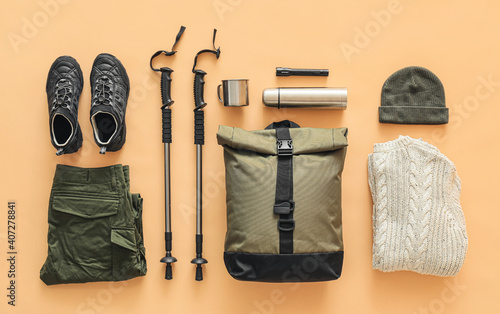 Fotografija Equipment for hiking on color background