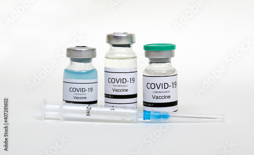Vaccine bottles isolated on white.