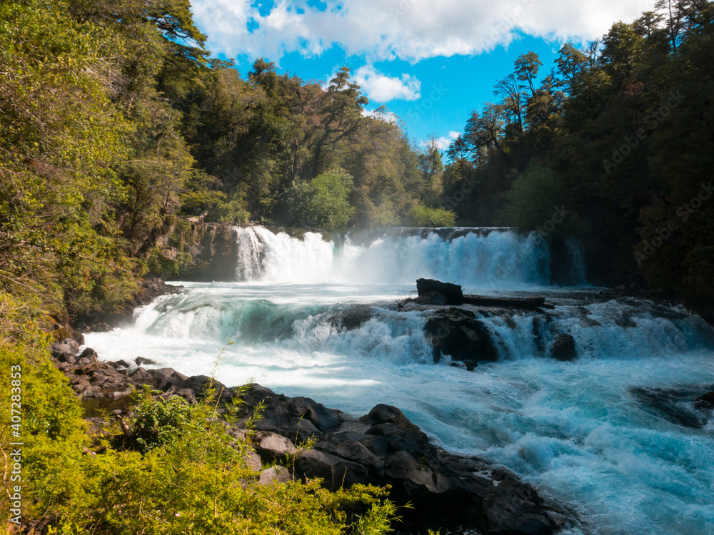 Fototapeta premium Waterfall of La Leona, in Huilo Huilo Biological Reserve, Los Ríos Region, southern Chile.