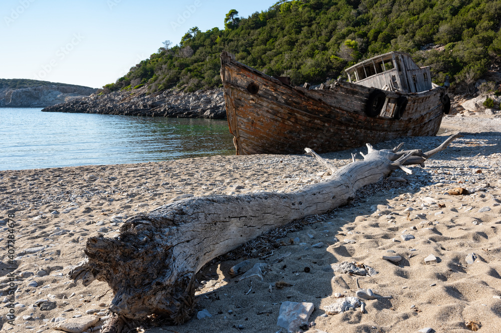 Shipwreck abandoned at a beach of Skyros island in Greece Shipwreck abandoned at a beach of Skyros island in Greece
