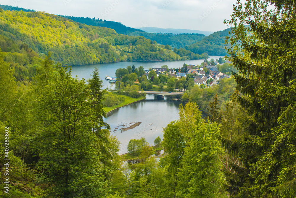 Rursee at Eifel National Park, Germany. Scenic view of lake Rursee and village Einruhr in North Rhine-Westphalia
