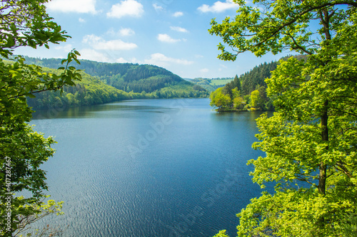 Rursee at Eifel National Park, Germany. Scenic view of lake Rursee and surrounded lush green landscape in North Rhine-Westphalia