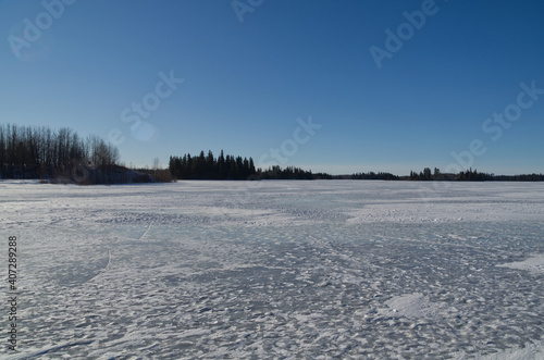 Astotin Lake Frozen on a Sunny Winter Day