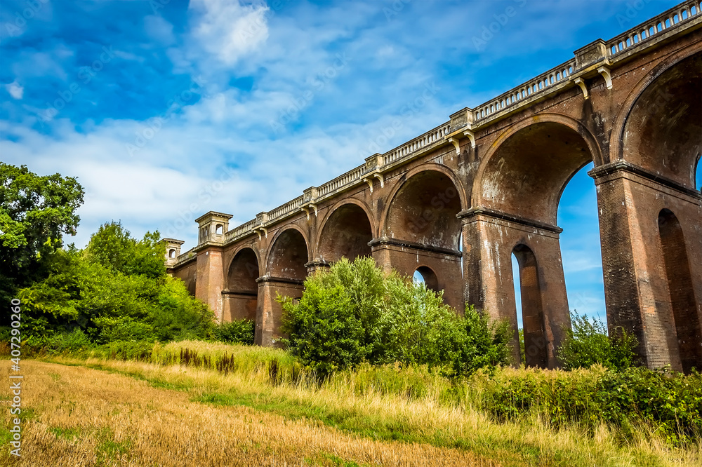 A view of the northern section of the Ouse Valley viaduct in Sussex, UK on a summers day