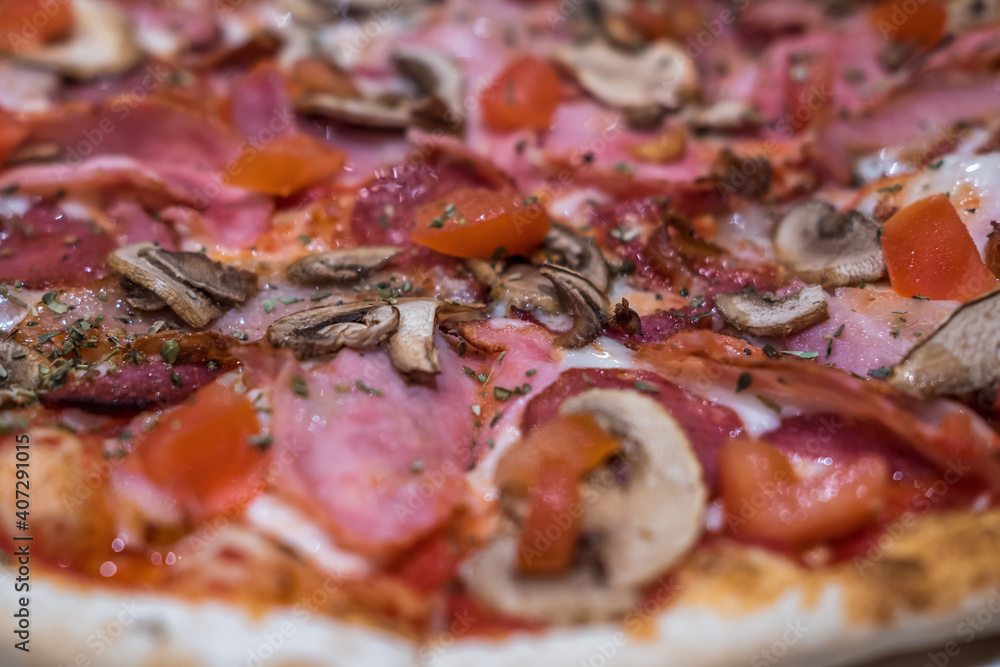 Delicious classic italian Pizza Carbonara with ham, tomatoes, mushrooms and cheese Delicious classic italian Pizza Carbonara with ham, tomatoes, mushrooms and cheese