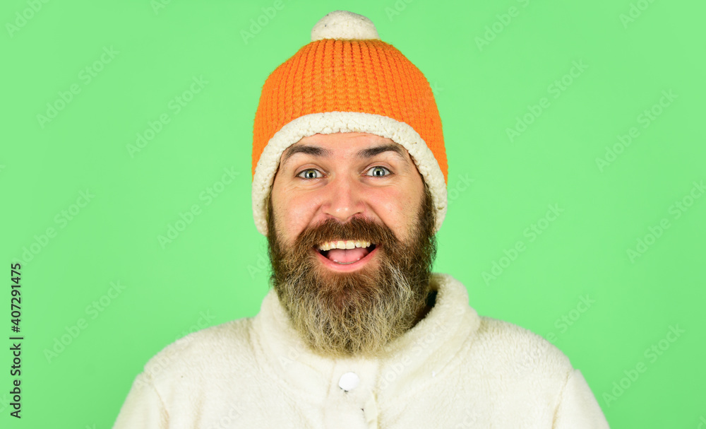 Head in warm hat. Handsome man knitted hat with pom pom. Fashion concept. Winter clothes and accessories. Mature emotional hipster funny style accessory. Feeling good. Bearded hipster. Hipster style Head in warm hat. Handsome man knitted hat with pom pom. Fashion concept. Winter clothes and accessories. Mature emotional hipster funny style accessory. Feeling good. Bearded hipster. Hipster style