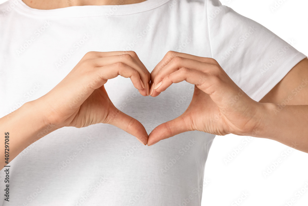 Woman making heart with her hands, closeup Woman making heart with her hands, closeup