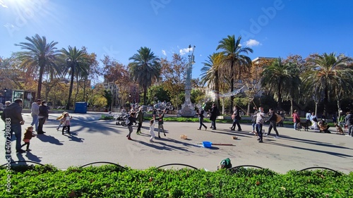 kids playing with soap bubble at the Citadel Park, the Ciutadella Park is the largest park in Barcelona. Spain
