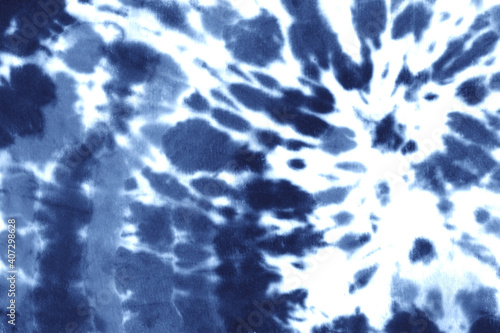Tie dye spiral shibori indigo blue navy white abstract background. Vector
