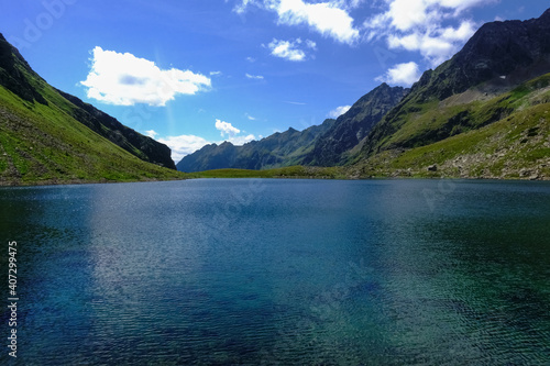 deep blue water from a mountain lake in the summer