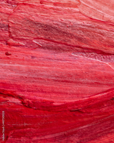 Close up Texture Red color paint, visible pattern of brush strokes. 